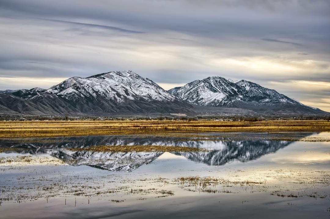 Mountains above Spanish Fork, Utah, reflected in valley water